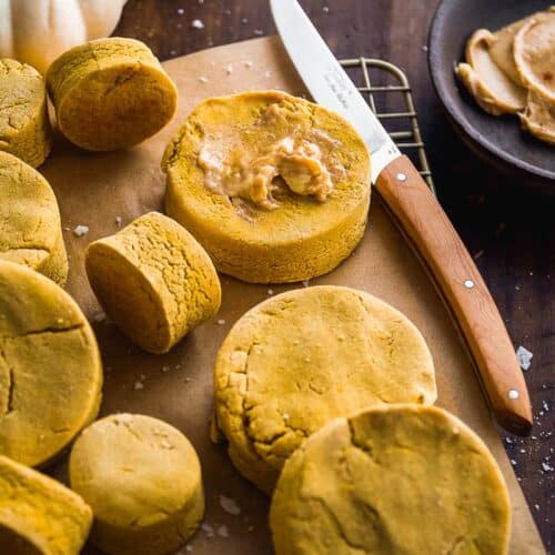 Pumpkin biscuit on wire rack with butter.