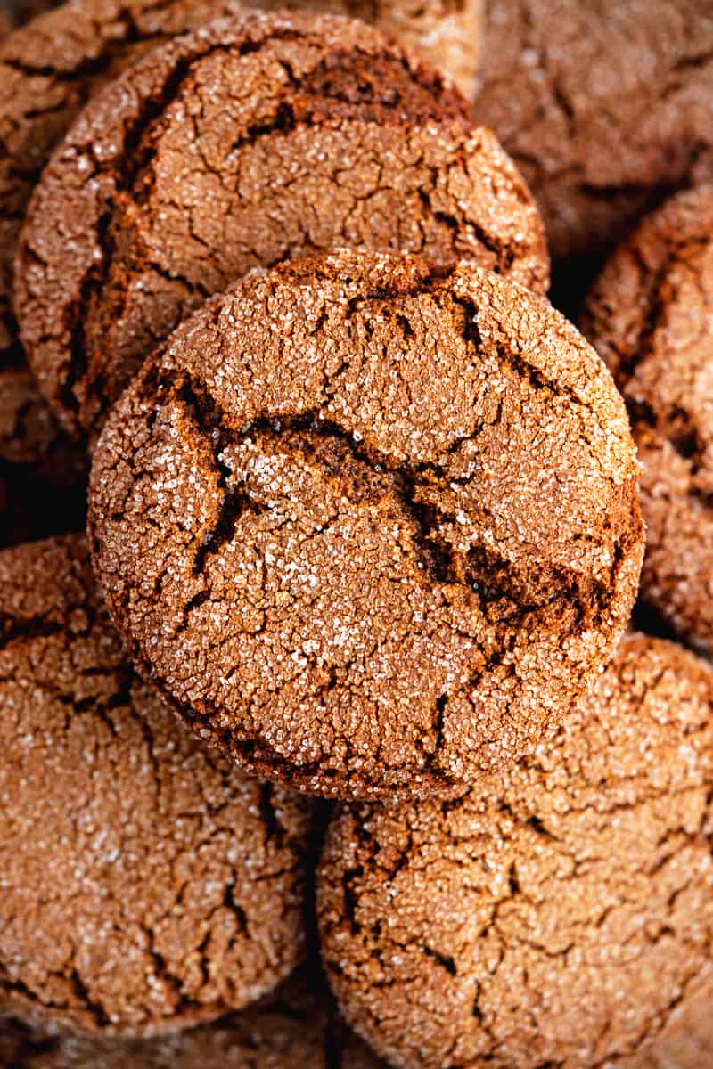 Up close image of ginger snap cookies with sugar on the outside.