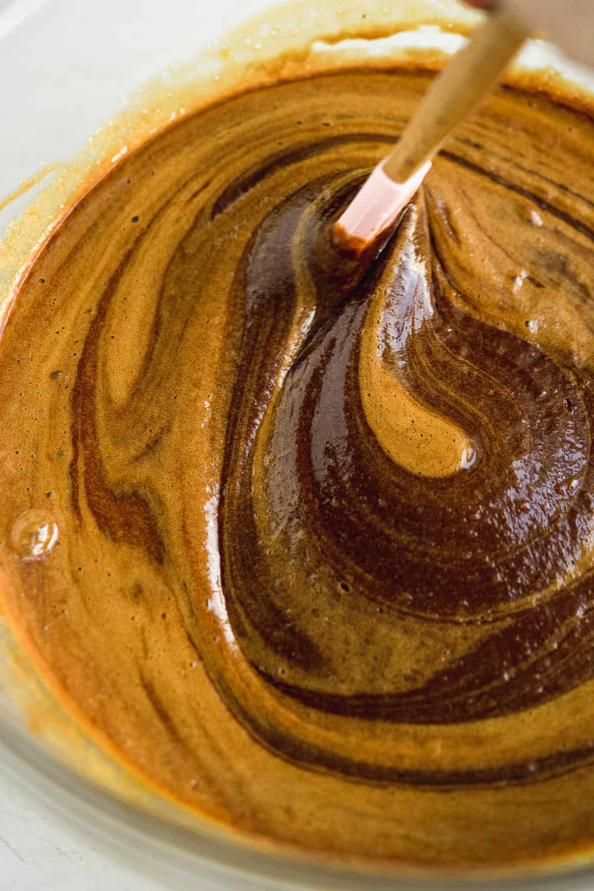 Picture showing the melted chocolate folded into the egg mixture. 