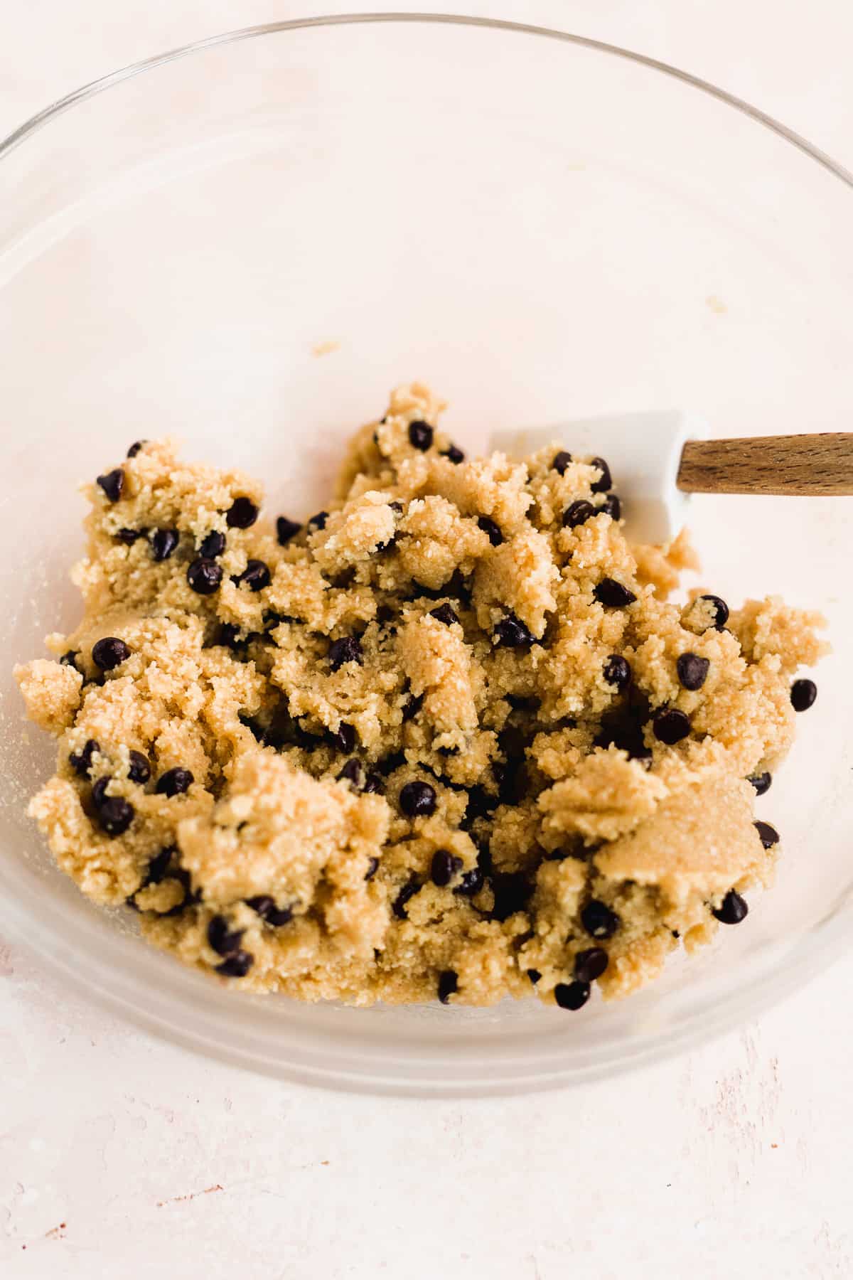 Edible cookie dough in a glass bowl.