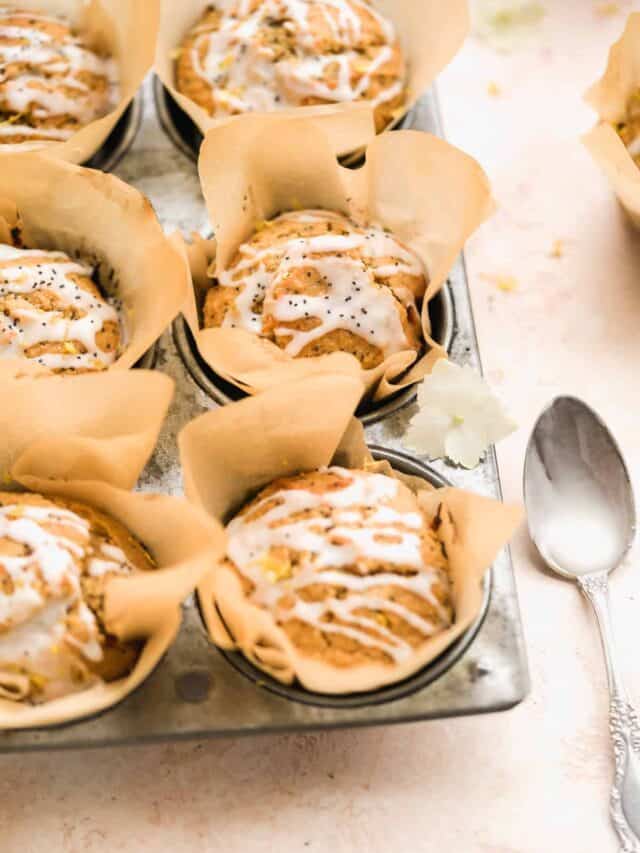 Lemon poppy seed muffins in a muffin tin