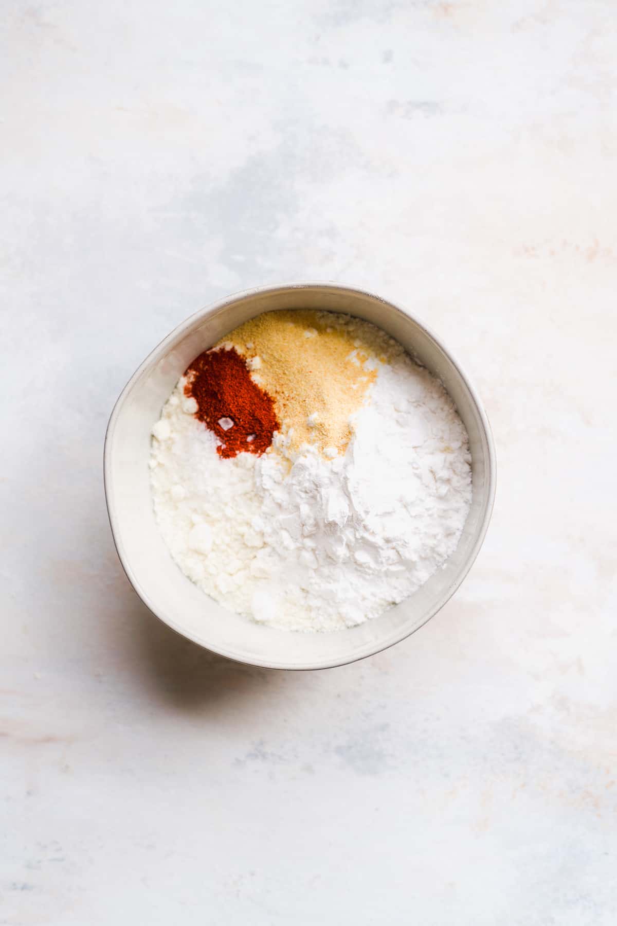 Overhead view of dry ingredients in a bowl.