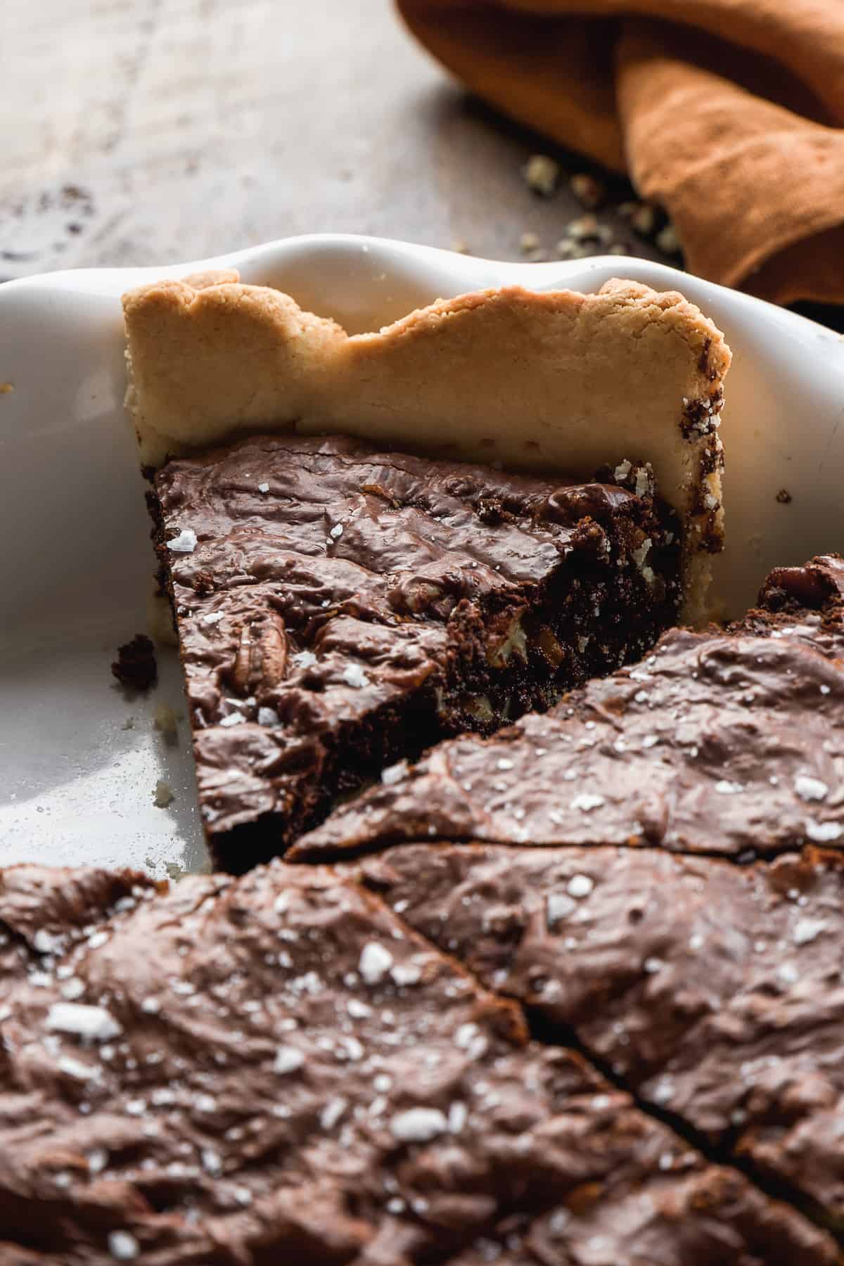 Image of brownie pie slice in the pie pan.