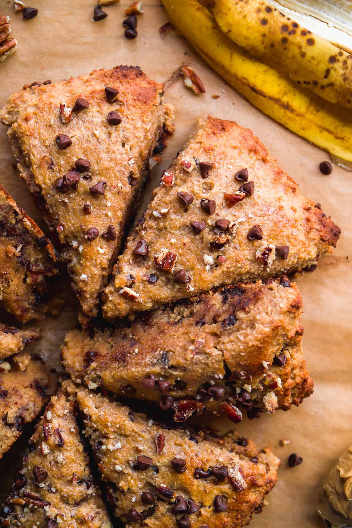 Banana chocolate chip scones on parchment paper.