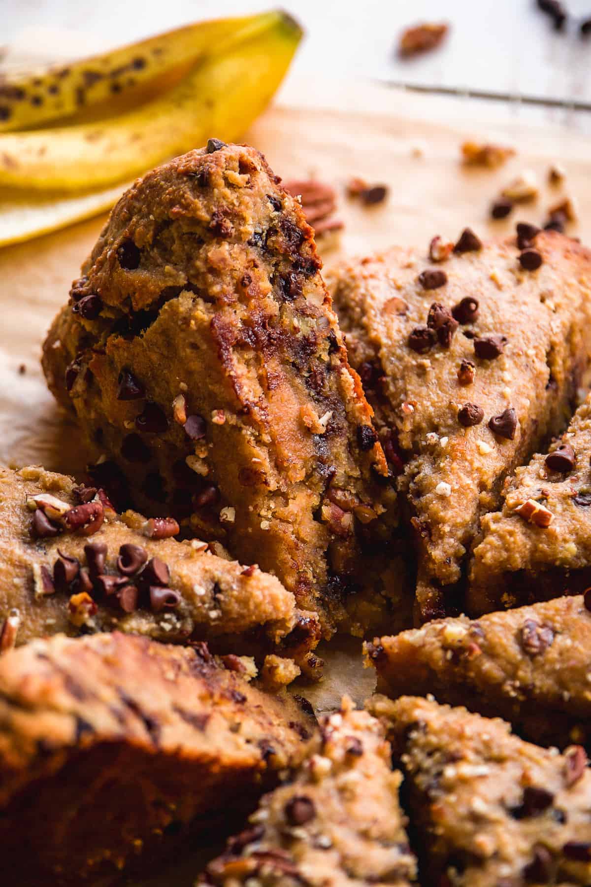 Chocolate chip banana scones on parchment paper.