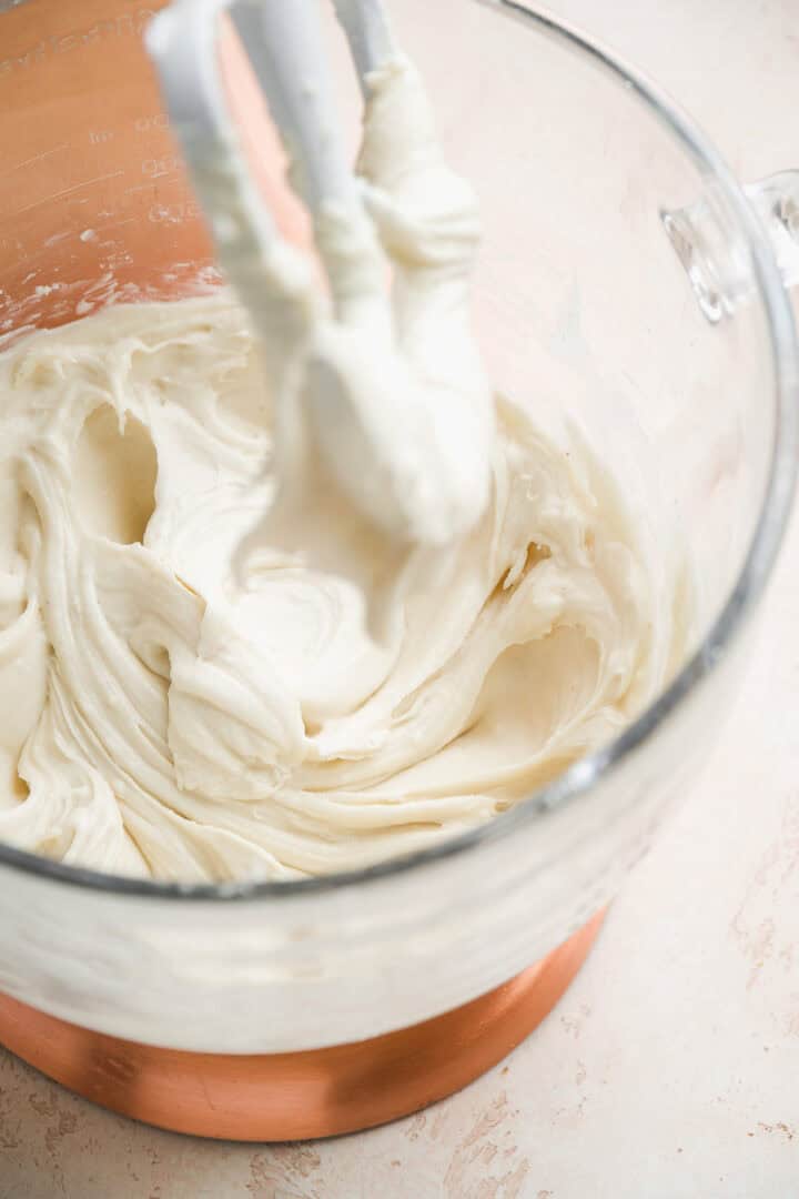 White chocolate cream cheese frosting in a mixing bowl.