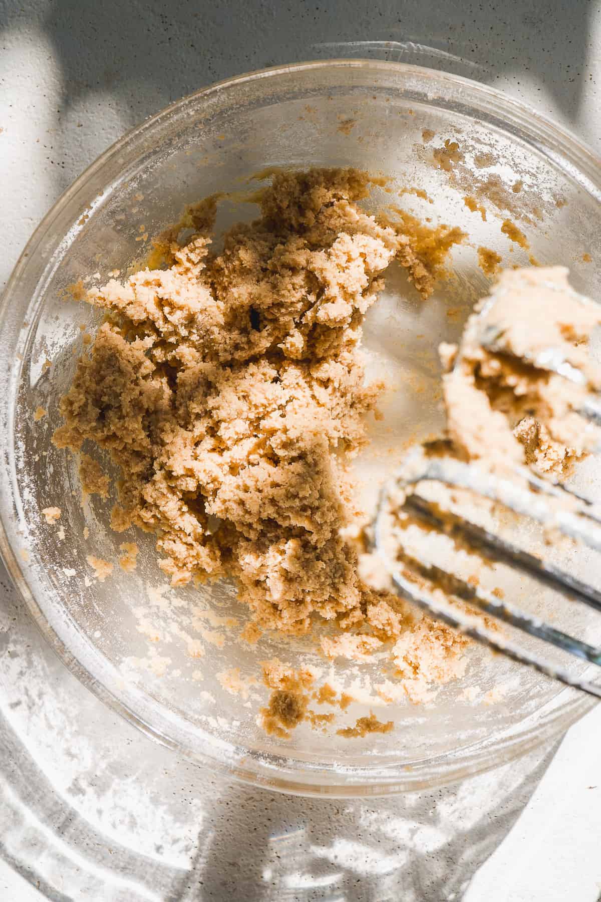 Overhead view of oatmeal cookie dough being mixed.