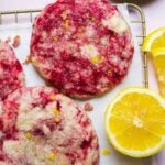 Raspberry swirled lemonade cookies on a wire rack.