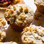 Gluten free blackberry muffins with streusel on top.