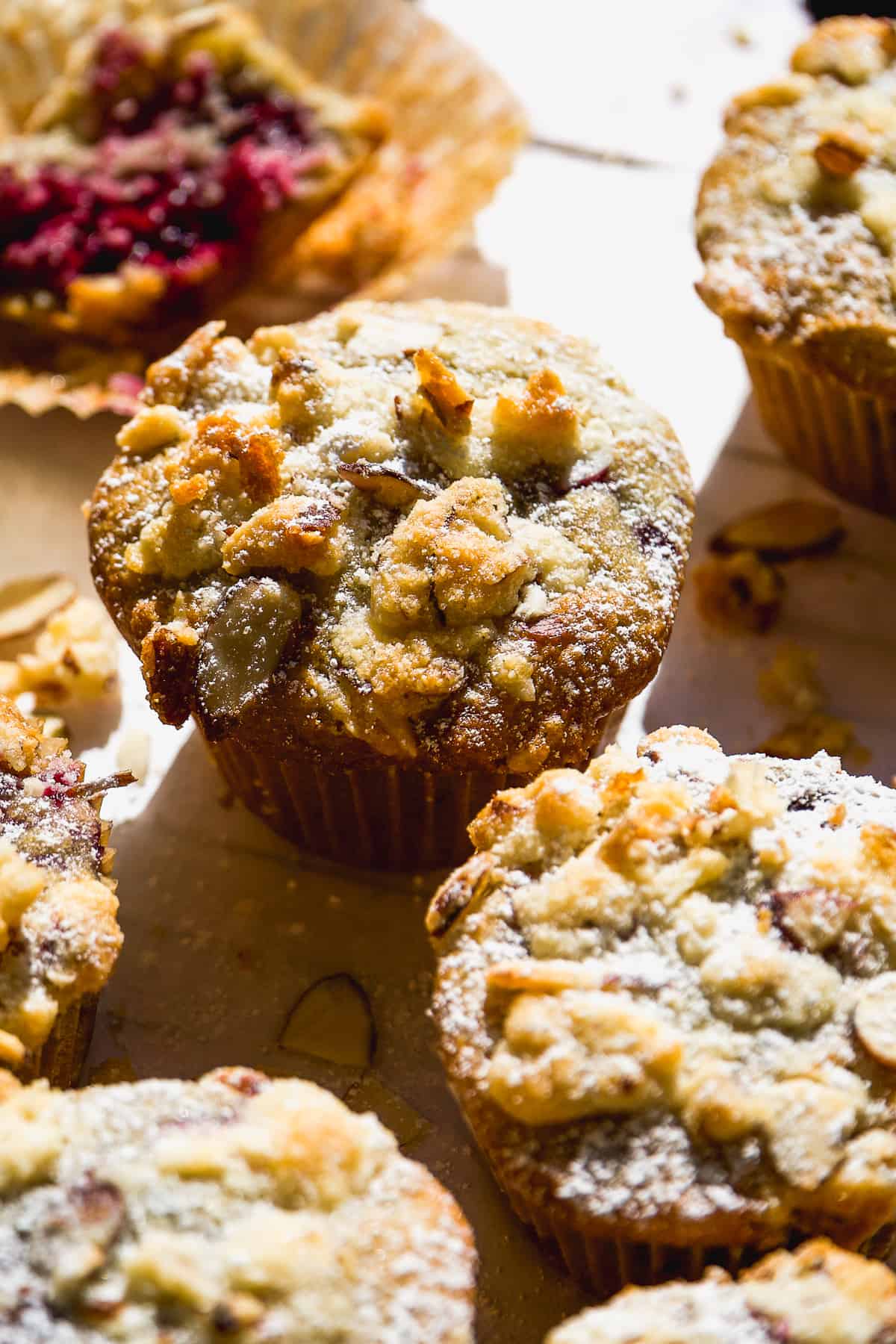 Gluten free blackberry muffin with streusel on top.