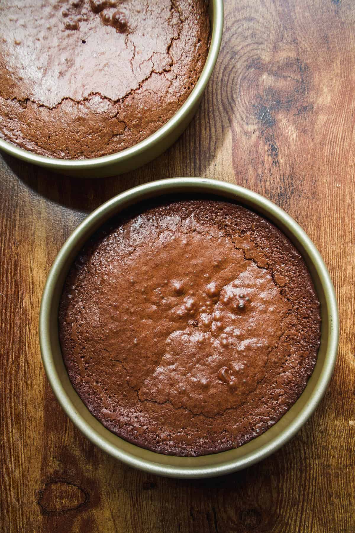 Brownie cake layers baked in a pan.