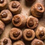Mini churro donut holes with chocolate SunButter in the center.