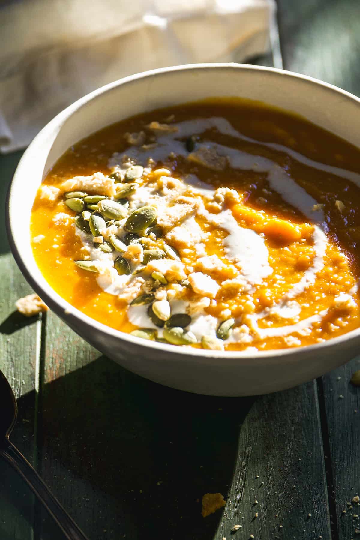 Pumpkin sweet potato soup with pumpkin seeds.