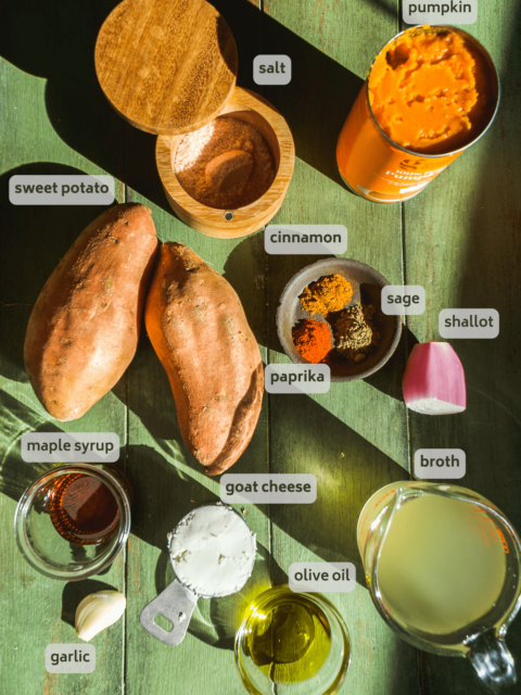 Pumpkin sweet potato soup ingredients on a green surface.