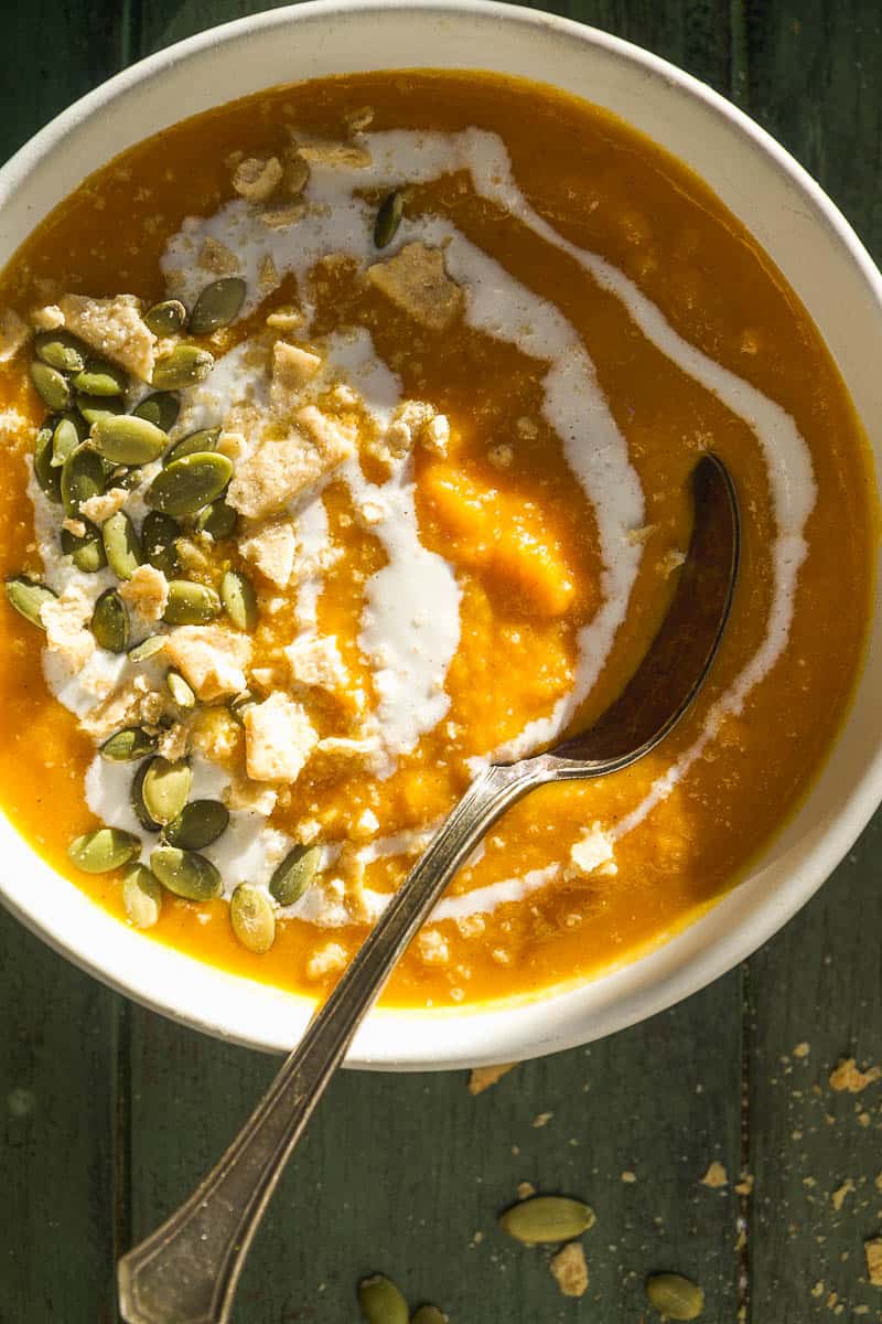 Overhead view of pumpkin sweet potato soup in a bowl.