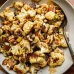 A platter of roasted tahini cauliflower from above.
