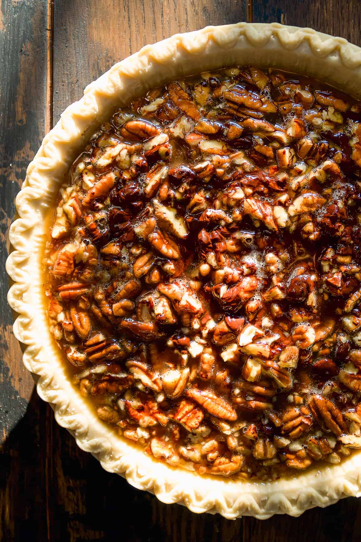 Overhead view of a turtle pie about to be baked.