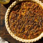 Turtle pie with caramel drizzled on top.