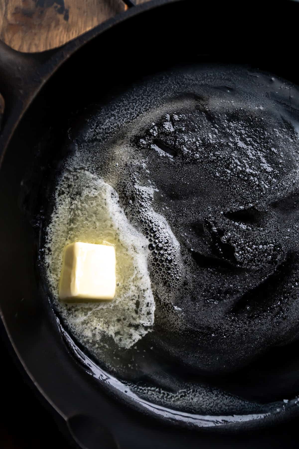 Butter cooking in a cast iron skillet