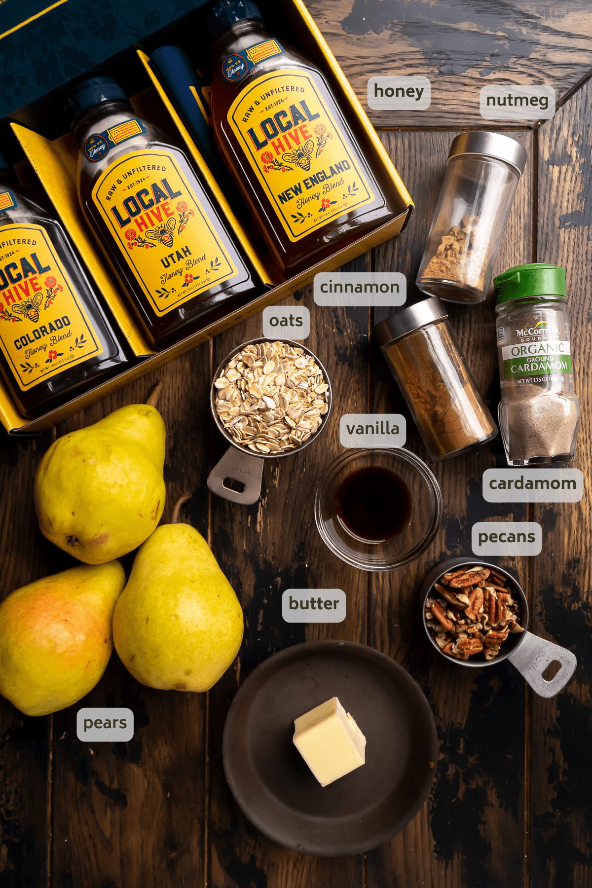 Caramelized pear ingredients on a wooden surface.