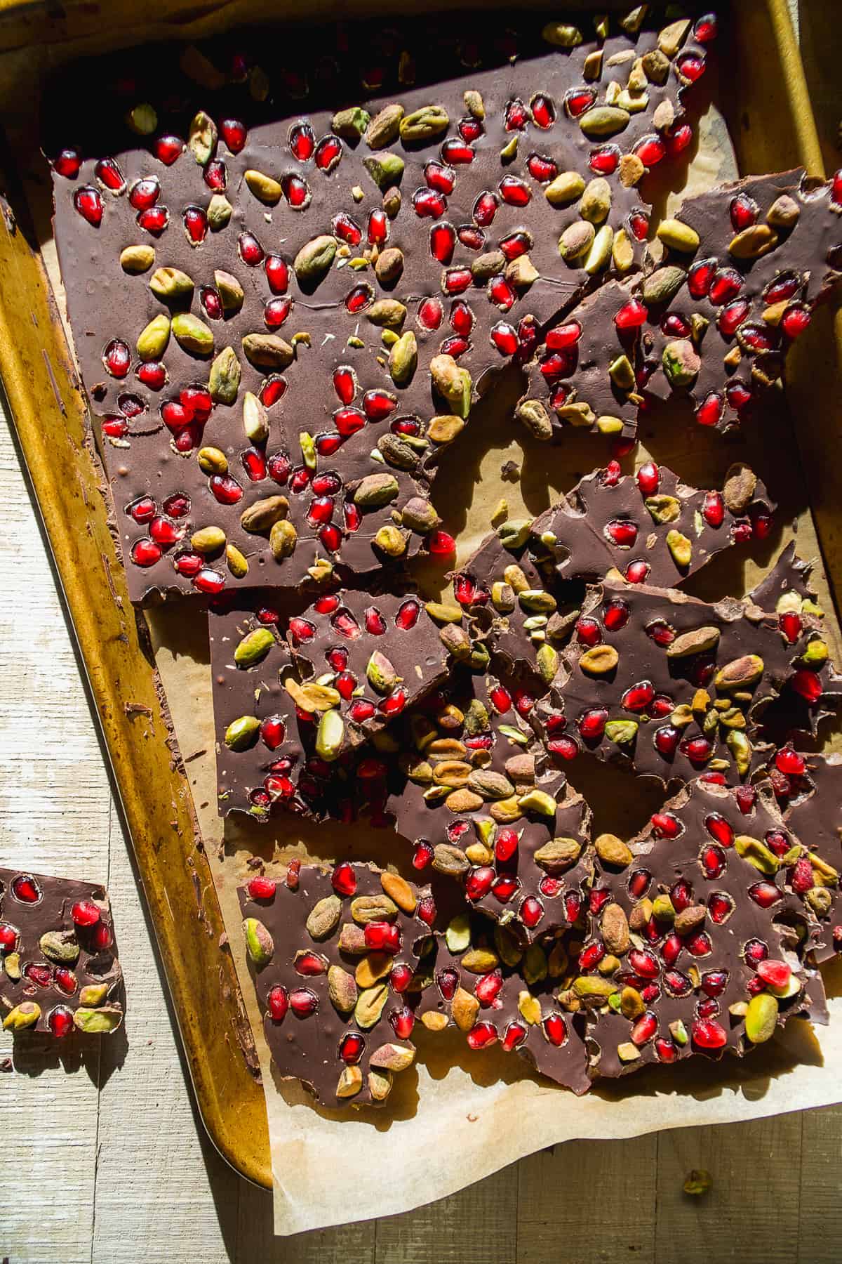 Christmas bark with pomegranates and pistachios on top.