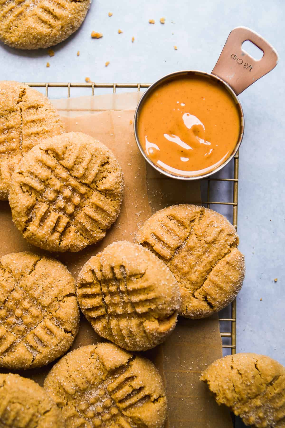 Almond flour peanut butter cookies on a wire rack cooling.