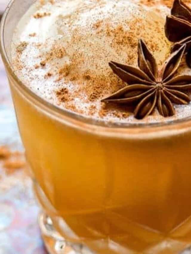 Close image of chai old fashioned in a cocktail glass