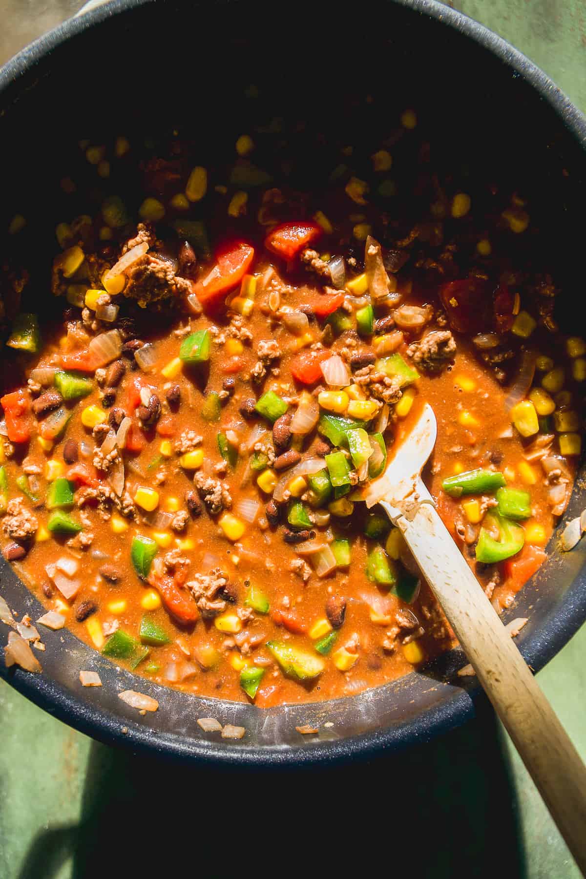 Sweet chili cooking in a large pot.