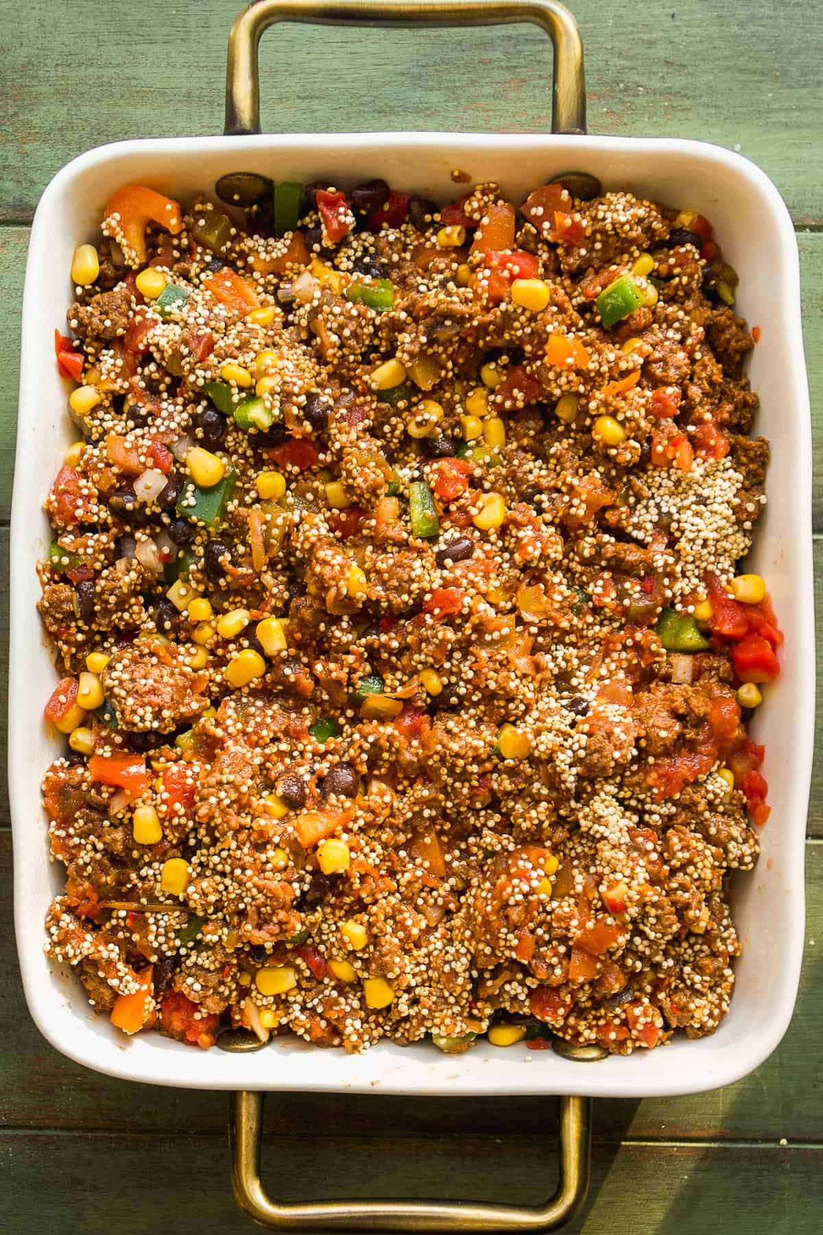 Taco casserole with quinoa about to be baked.