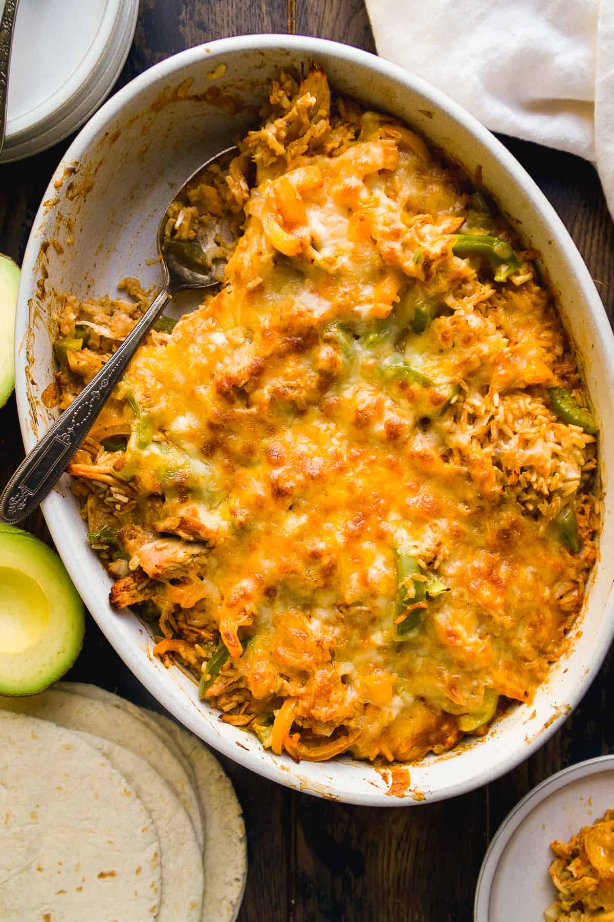 Fajita casserole with chicken and rice in an oval dish.