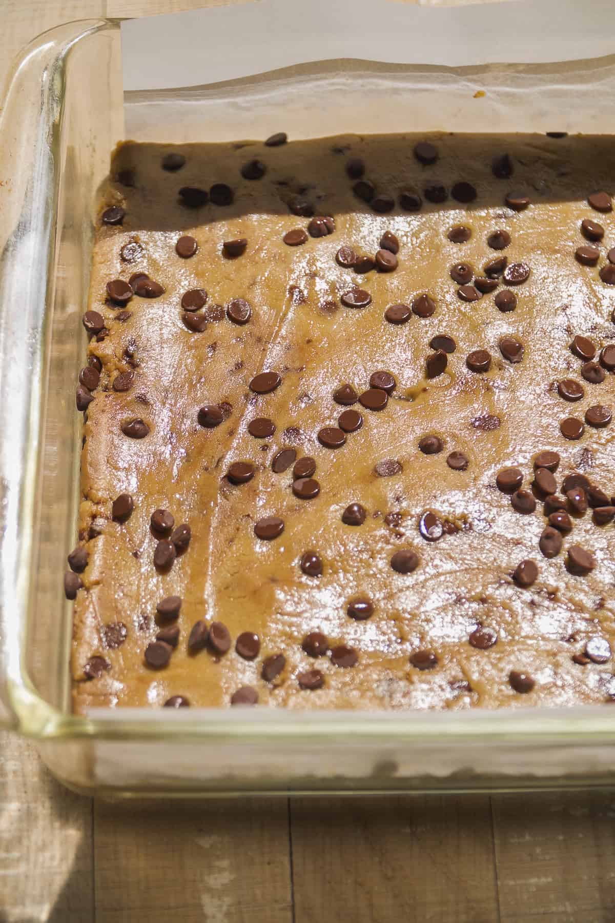 Cookie dough protein bars in a glass pan.