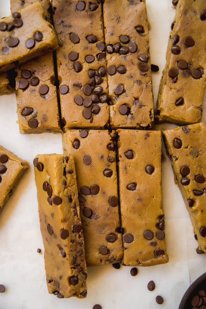 Cookie dough protein bars with chocolate chips cut into rectangles.