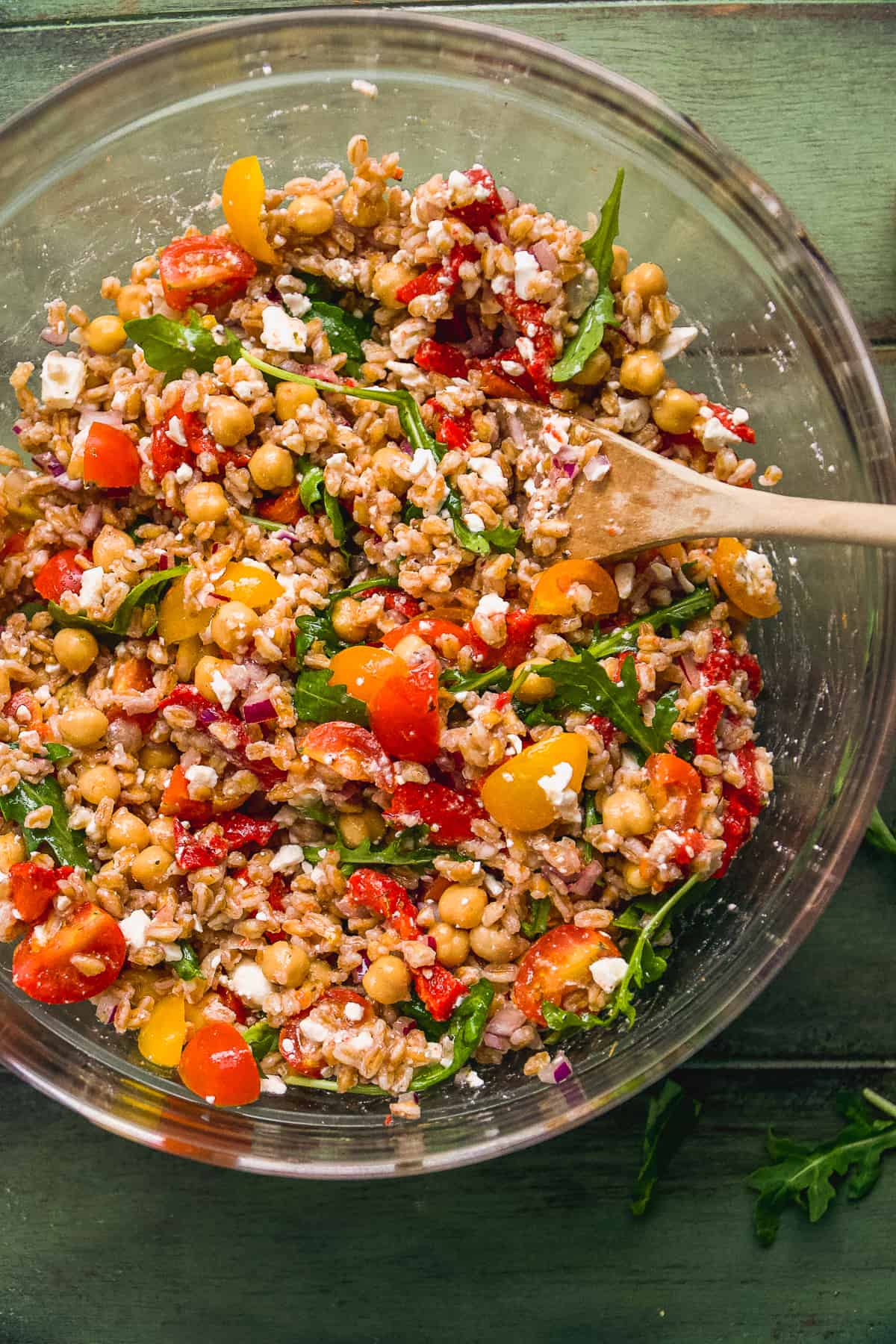 Mediterranean salad with farro in a large bowl.