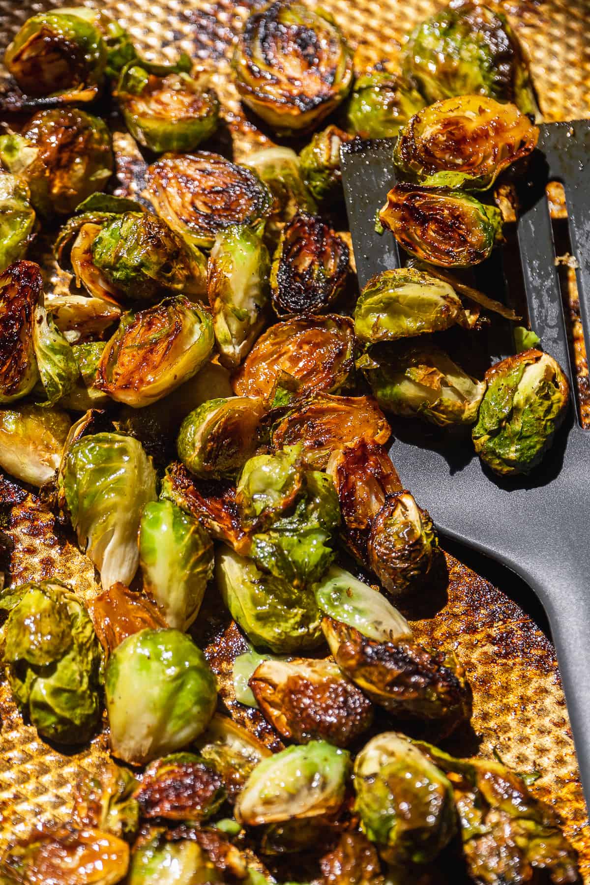 Caramelized brussel sprouts on a baking sheet.