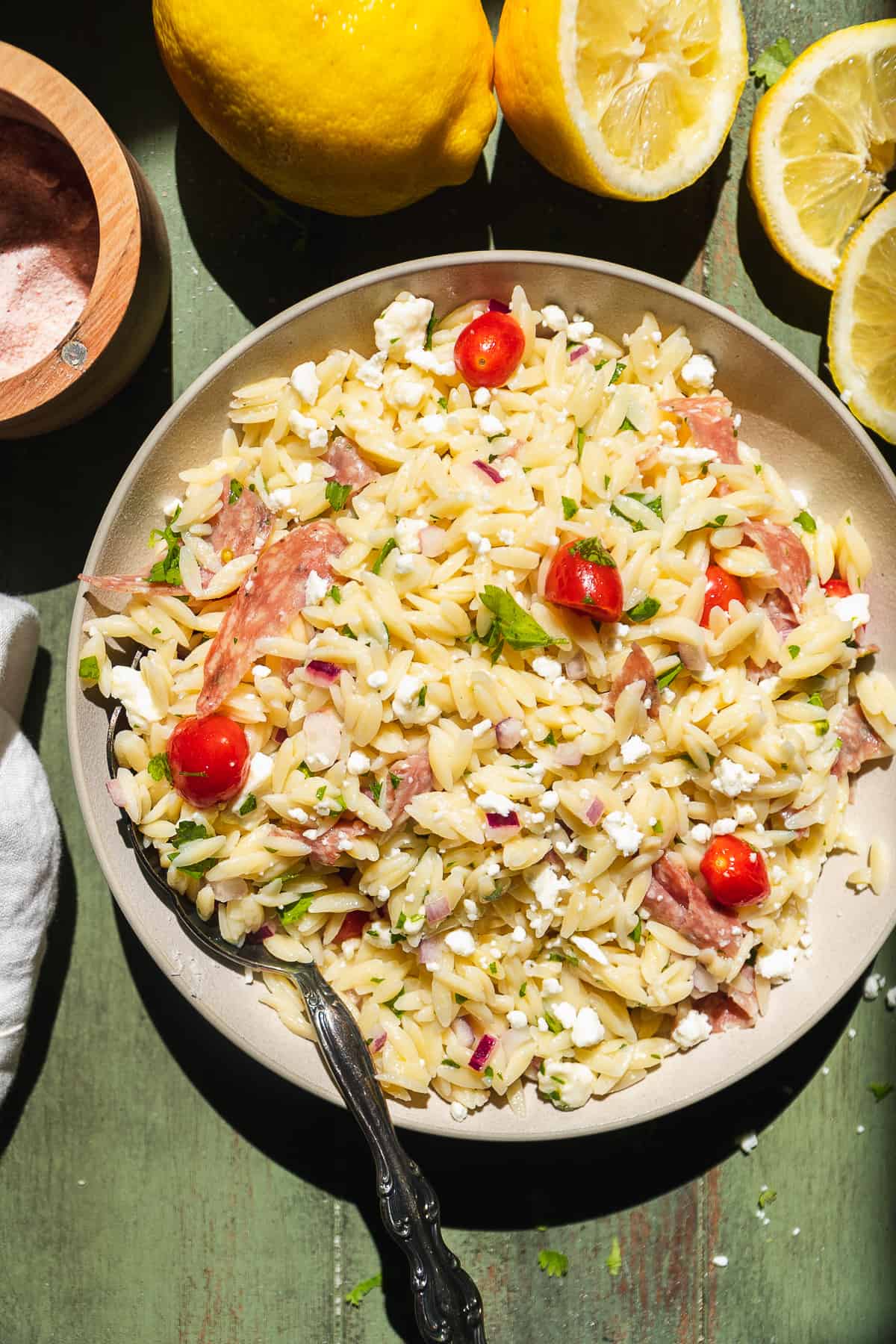 Overhead view of a dish with lemon orzo pasta salad.