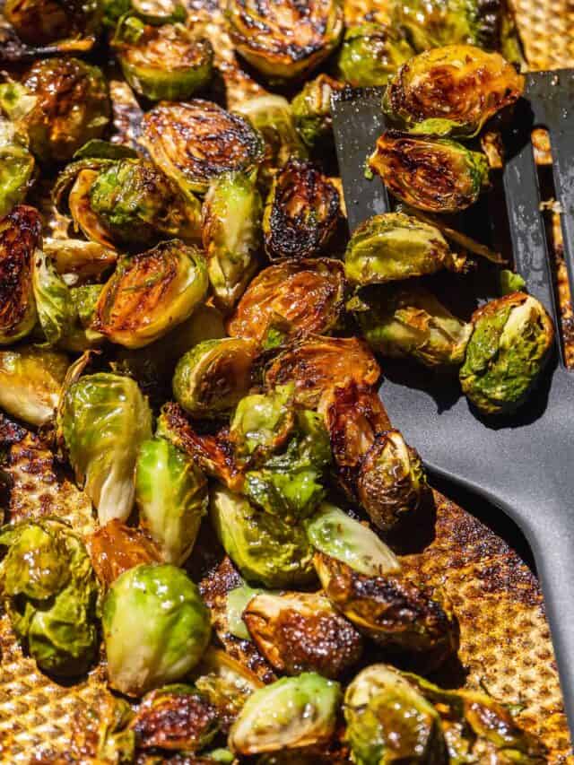 Caramelized brussel sprouts on a baking sheet.