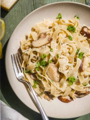 Truffle pasta in a bowl with herbs.