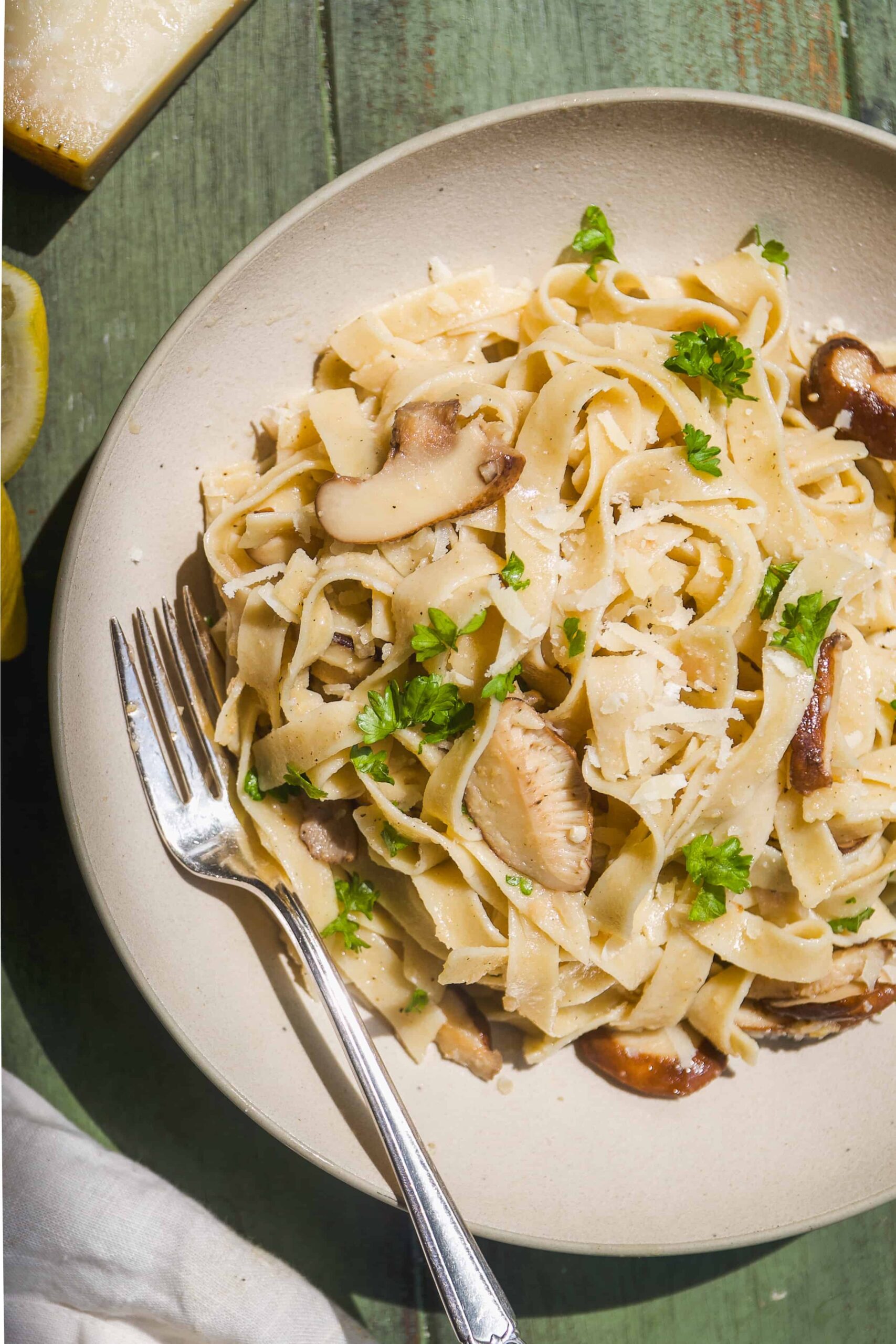 Truffle pasta in a bowl with herbs.