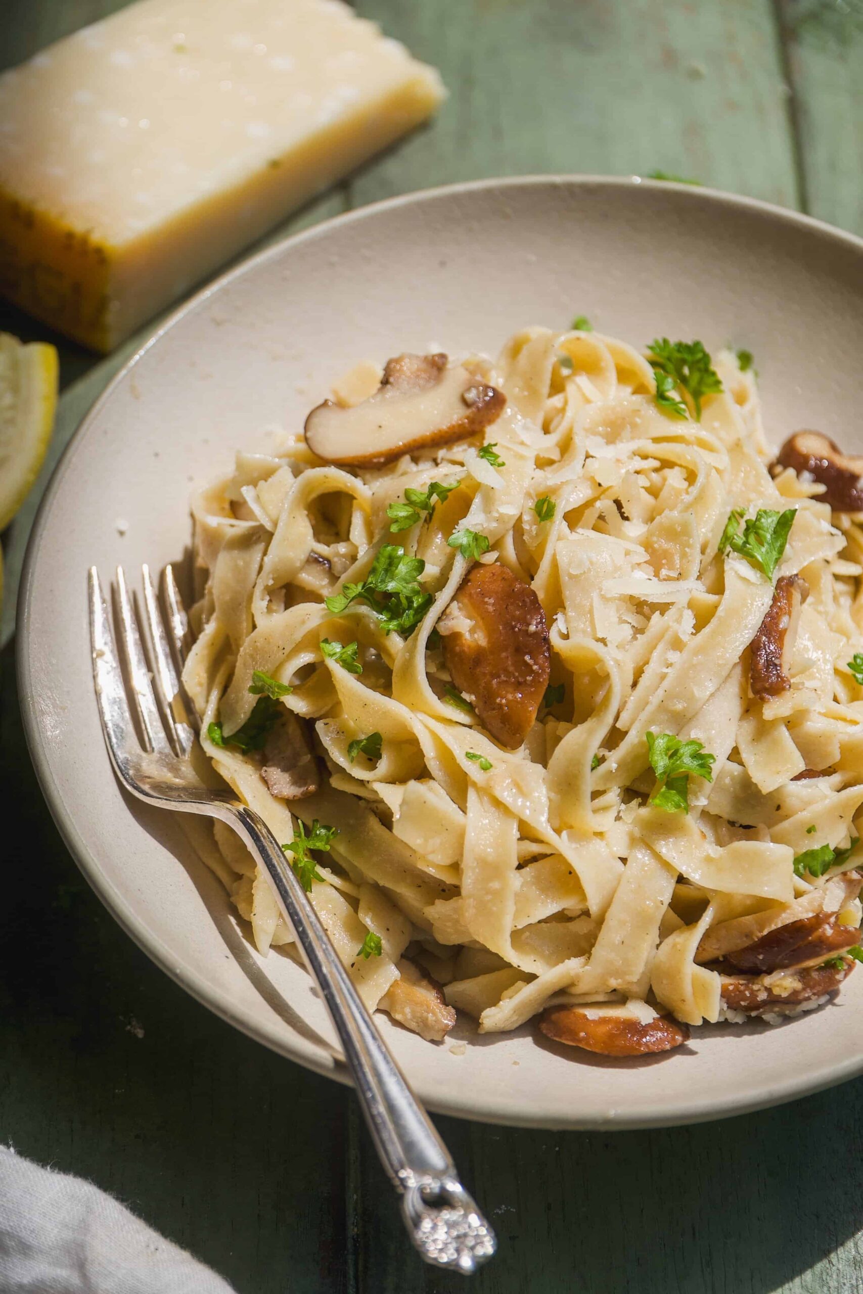 Bowl with noodles in a truffle pasta sauce with herbs.