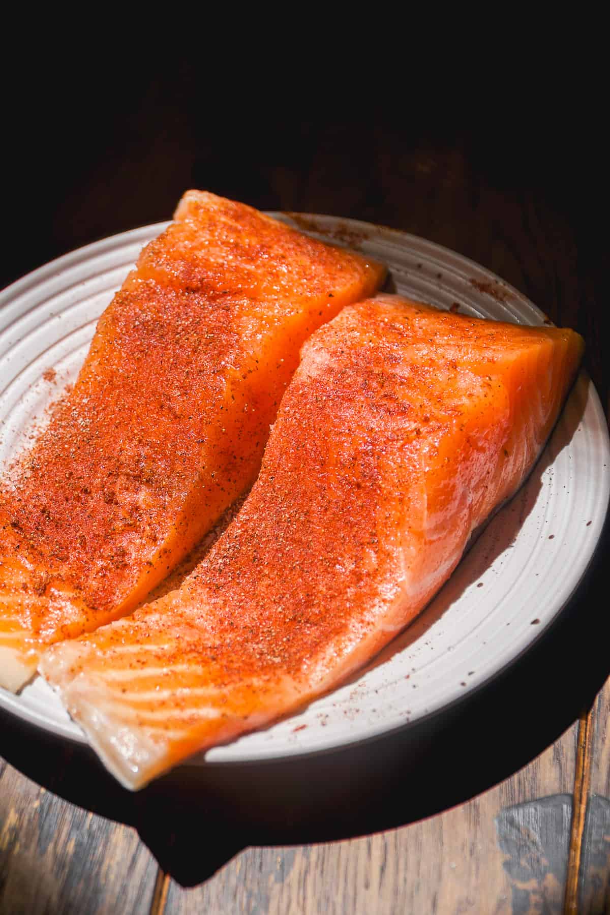 Salmon filets with seasonings about to be air fried.