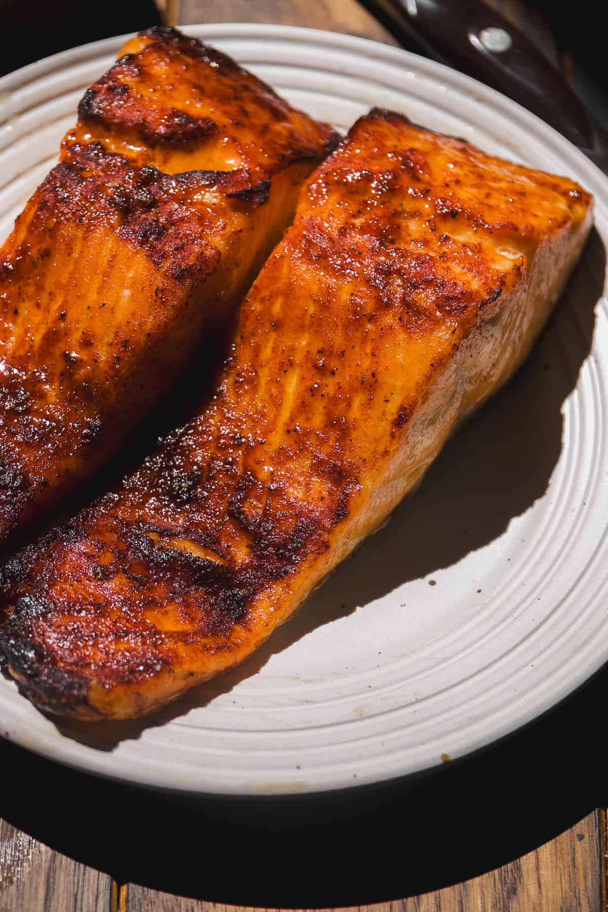 Air fried garlic honey salmon on a plate.