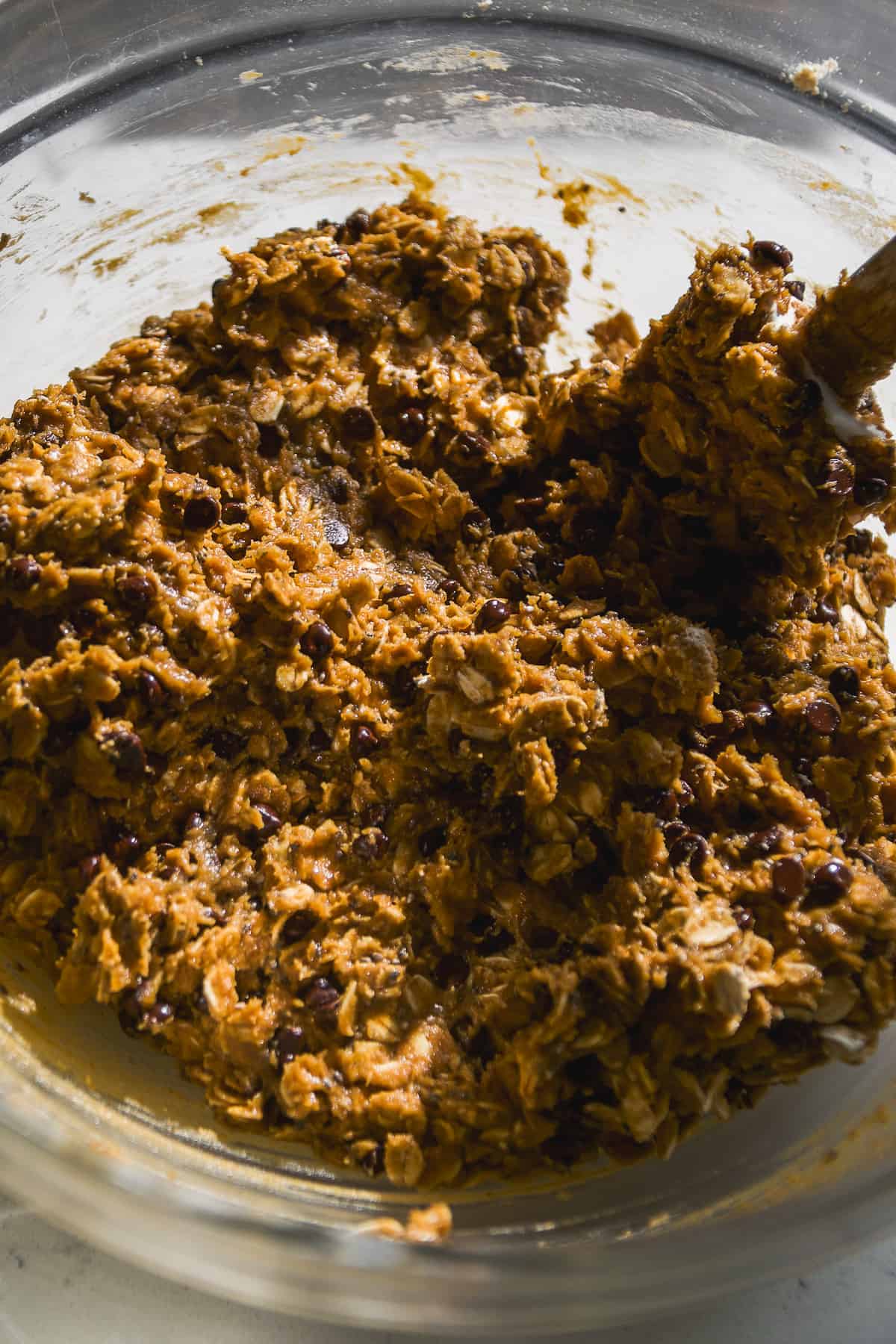 Pumpkin protein ball mixture with chocolate chips in a bowl.