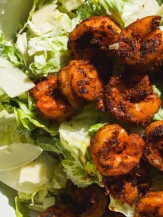 Shrimp Caesar Salad in a white bowl.