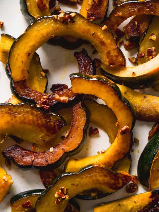 Pecan maple roasted acorn squash slices.