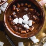 Dairy free hot chocolate in a mug with marshmallows.