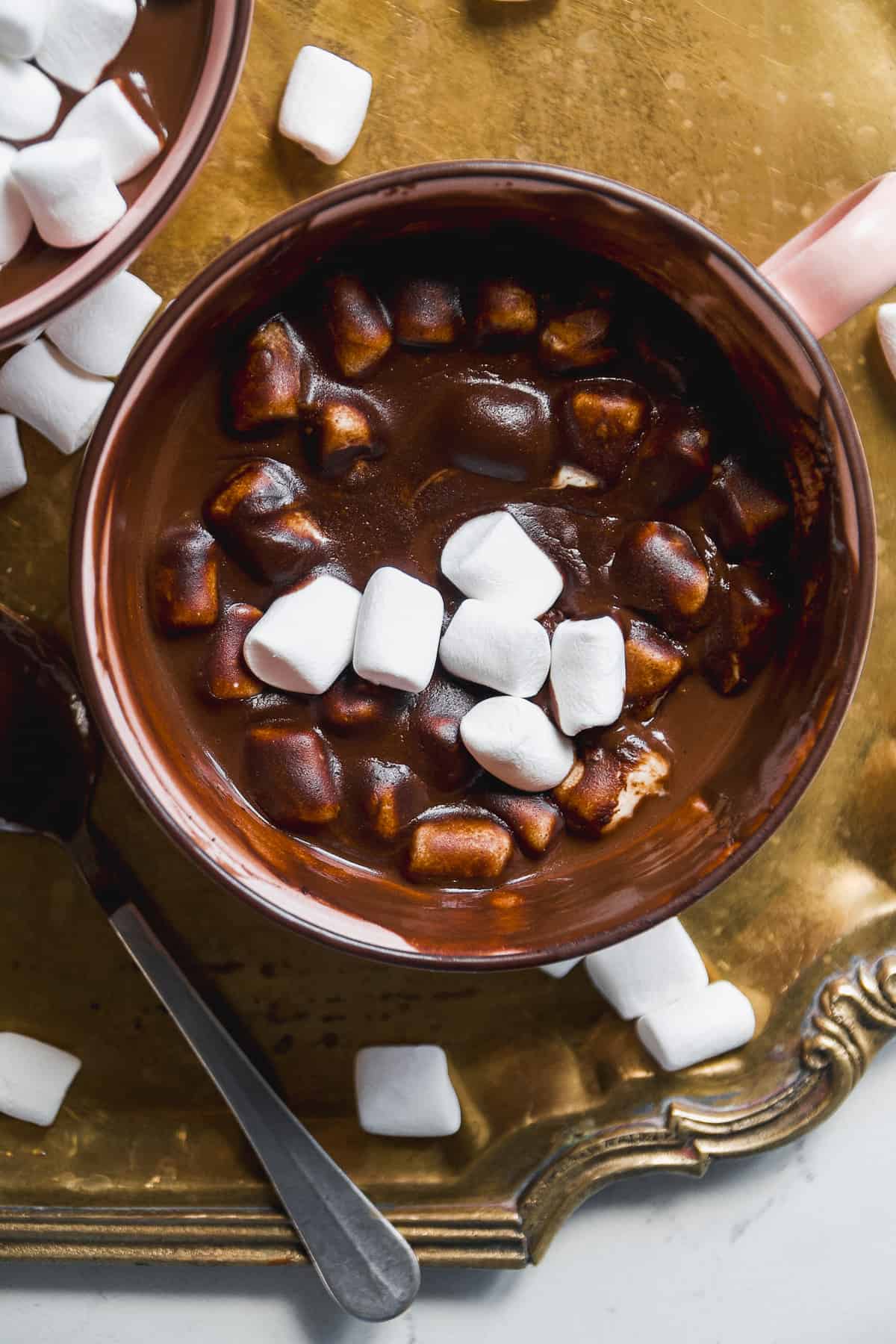 Dairy free hot chocolate in a mug with marshmallows.