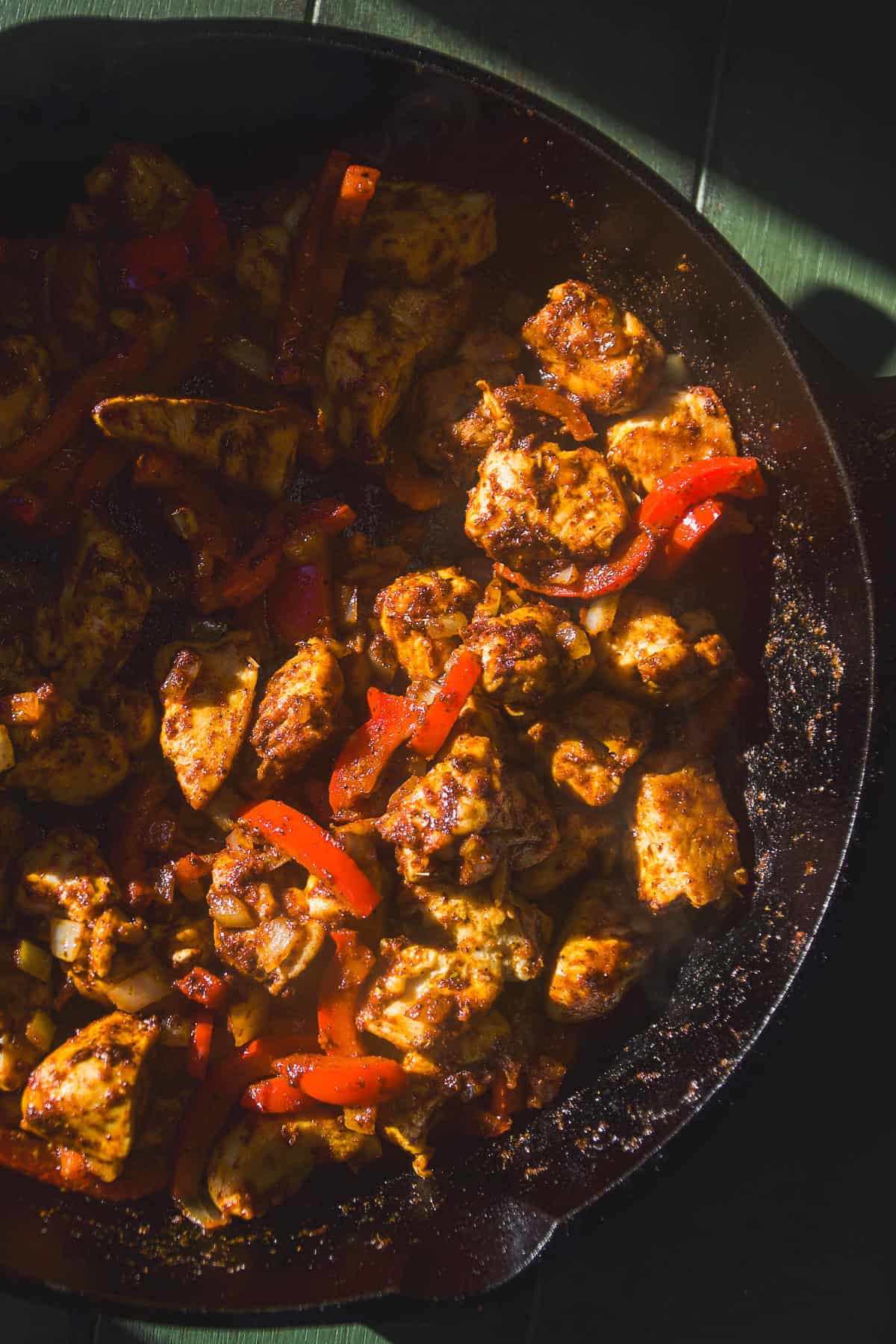 Chicken tossed with taco seasonings and red bell peppers.