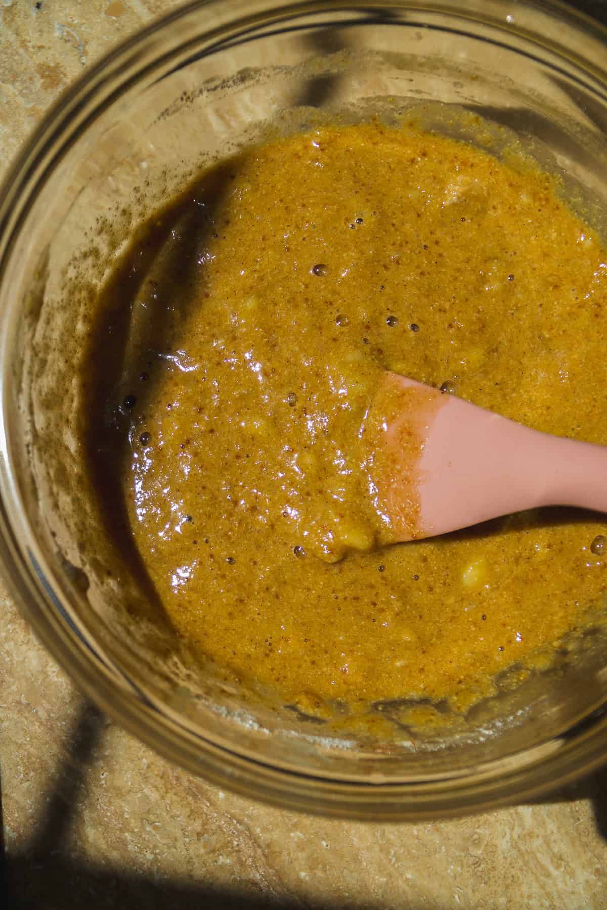 Banana bread mug cake batter in bowl.