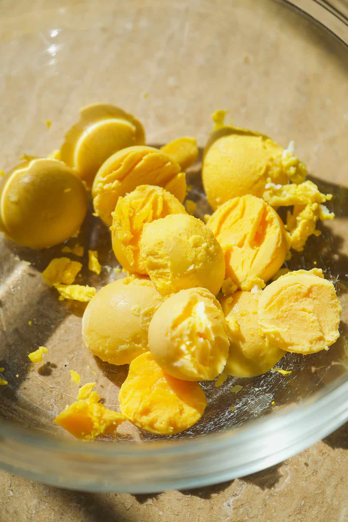 Hard boiled egg yolks in a mixing bowl.