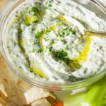 Tzatziki with cucumber and dill in a bowl.